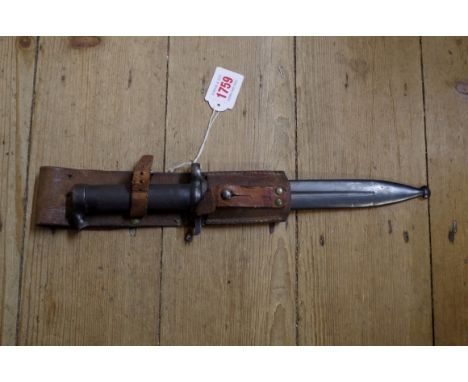 A Swedish M1896 pattern bayonet and scabbard, by Eskilstuna Iron, having conical stud, with leather frog, 21cm blade. 