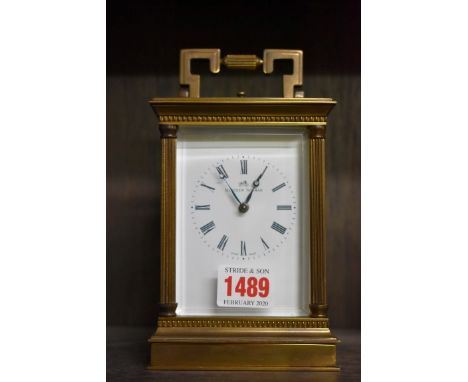 A good brass carriage clock, by Matthew Norman,&nbsp;with gong strike and push button repeat, height including handle 18cm. 
