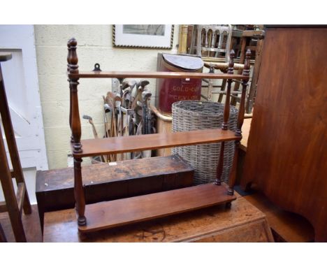 A&nbsp;mahogany three tier open hanging shelf, 57cm wide.&nbsp; 