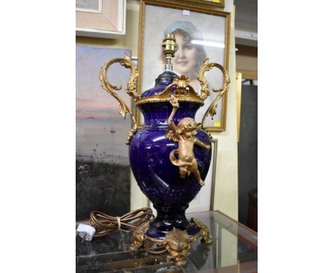 (HP) A blue glazed pottery and gilt metal mounted table lamp,&nbsp;height to top of handle 45cm.&nbsp; 