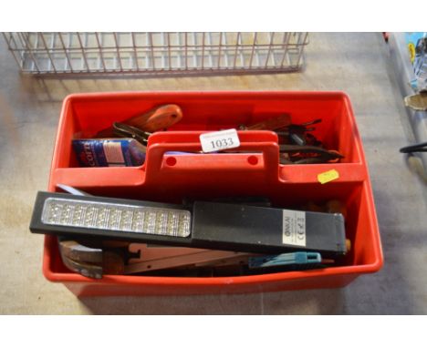 A plastic tray of various tools