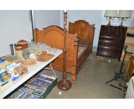 An oak turned standard lamp lacking shade