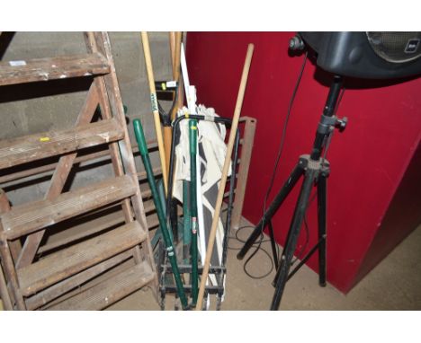 A quantity of garden tools; a parasol etc