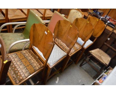 A set of four Art Deco style dining chairs