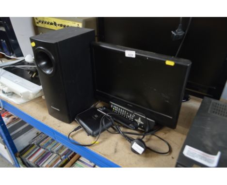 An Alba flat screen television with remote control; together with a Panasonic speaker