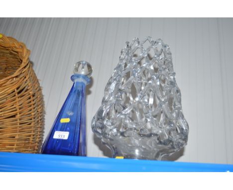 A blue glass decanter and stopper; together with a modern glass vase