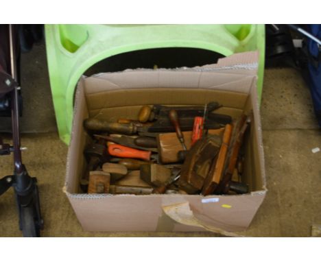 A box of various hand tools to include planes