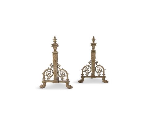  A LARGE PAIR OF NEO-CLASSICAL BRASS FIRE DOGS, EARLY 19TH CENTURY, surmounted with turned finial, above a stepped tapering u