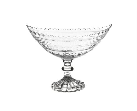 A LATE 18TH CENTURY FLAT CUT FRUIT BOWL, probably Waterford or Cork, of canoe form, with scalloped rim, the bowl with bands o