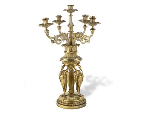 A FRENCH 19TH CENTURY ORMOLU FIVE LIGHT CANDELABRUM, of circular design with raised central socket, encircled by four scroll 