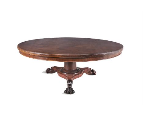 A LARGE VICTORIAN MAHOGANY CIRCULAR DINING TABLE, C.1850, the outhanging top with plain frieze, on a plain turned tapering ce