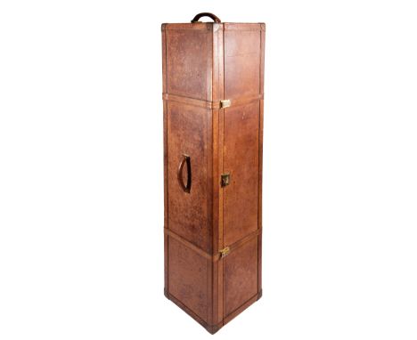 A Hennell's Paris handmade deluxe leather polo trunk,
of rectangular form with top and end carrying handle, the brass hinges 