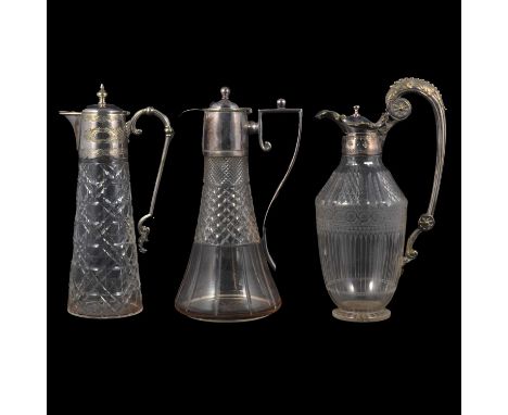 Victorian cut and engraved glass claret jug, silver plated mount with engraved initials, 29cm, and two similar cut glass clar