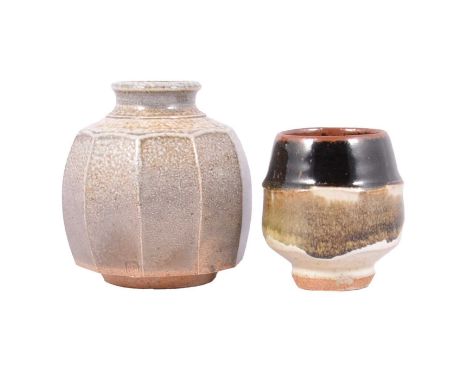 Two studio pottery vessels:Phil Rogers, stoneware yunomi, tenmoku glaze over a green oatmeal glaze, artist's seal, 9.5cm;Mick