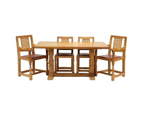 Robert 'Mouseman' Thompson of Kilburn, an oak 5' dining table and six chairs, the table of trestle form, the pedestals joined