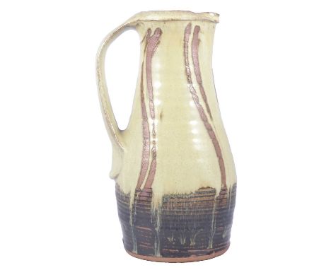 Phil Rogers, Large Jug,stoneware, oatmeal glaze over a tenmoku glaze, wax resist finger wipes,artist's seal, 32cm.Condition r