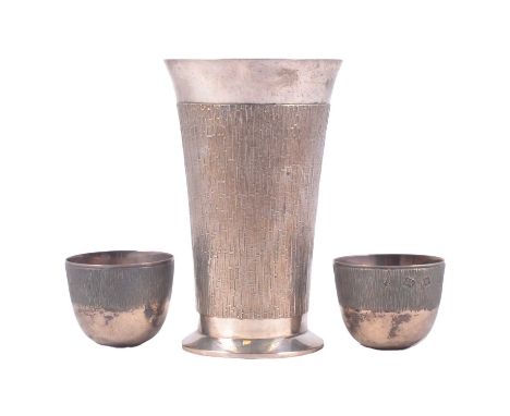 Modern silver beaker, C J Vander, London 1969, bark finish, 12.5cm, and two small tumbler cups, Payne &amp; Son, London 1924,