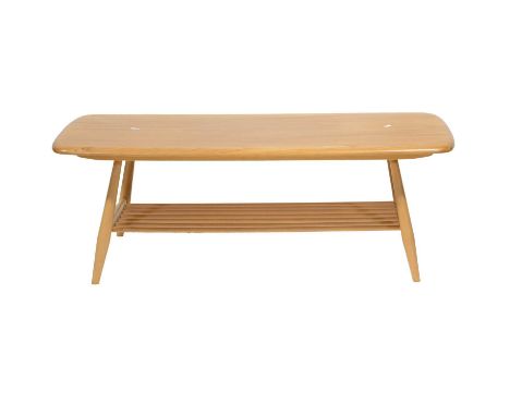 Ercol, coffee table with magazine shelf, elm and beech, the spindle legs joined by magazine rack, length 105cm, depth 46cm, h