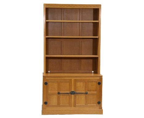 Robert 'Mouseman' Thompson of Kilburn, an oak sideboard bookcase, the top fitted with one fixed shelf and three adjustable sh