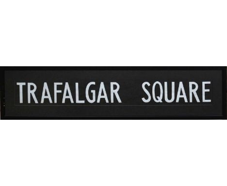 London Bus Destination Blind - TRAFALGAR SQUARE - white capital font against black paper ground, mounted and framed, overall 