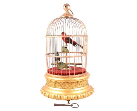 Large caged singing bird automaton, with two birds, 56cm, with key.  Condition report:The mechanism does work - please see up