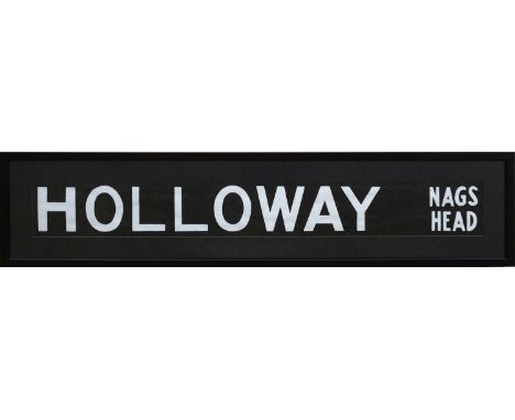 London Bus Destination Blind - HOLLOWAY / NAGS HEAD - white capital font against black paper ground, mounted and framed, over