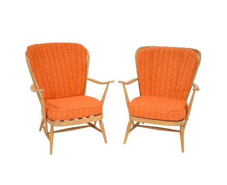 Ercol, a pair of light beech easy chairs, original upholstery in burnt orange, width 73cm.  Qty: 2  Condition report:It is ap