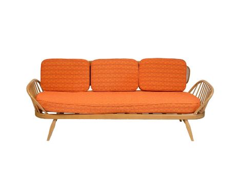 Ercol light elm and beechwood studio couch, original upholstery in burnt orange, length 210cm.