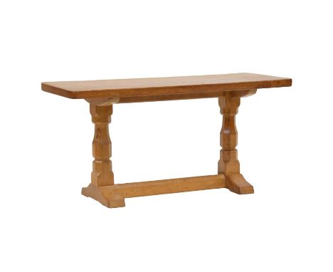 Robert 'Mouseman' Thompson of Kilburn, an oak coffee table, rectangular adzed top, raised on octagonal trestle base joined by