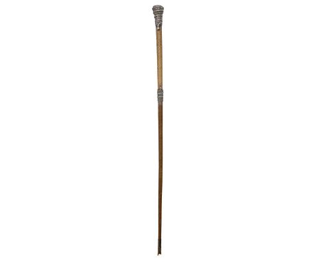 Indian inspired riding crop, leather bound and with metal metal grip and ferrule decorated with coiled snakes set with ruby-c