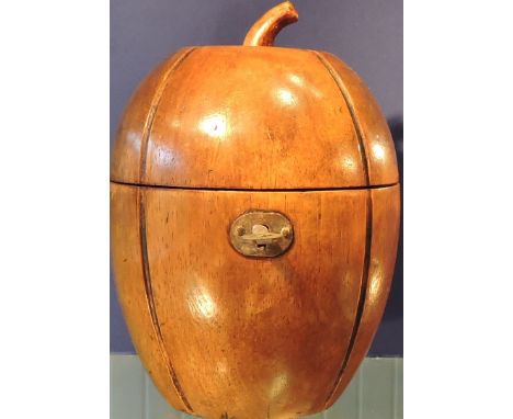 An antique style fruitwood melon shaped tea caddy