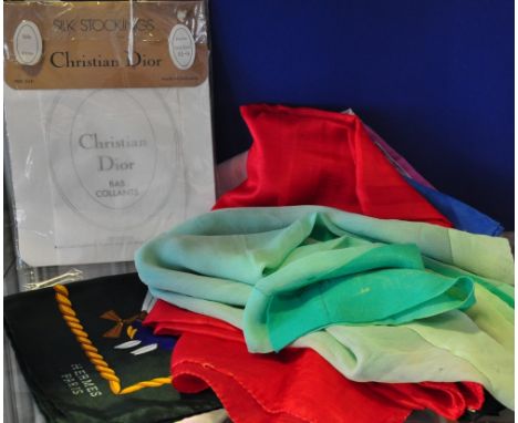Nine vintage scarves including one marked "Hermes" and a pair of Christian Dior silk stockings