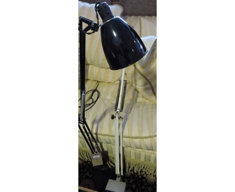 A vintage angle-poise blak metal and cast iron lamp together with a similar wall mounted angle-poise lamp