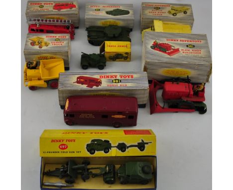 Eight boxed Dinky Toys die cast vehicles comprising 961 Blaw Knox Bulldozer, 965 Euclid rear Dump Truck, 962 Dumper Truck, 98