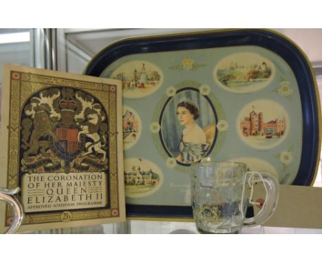 A 1953 Coronation souvenir tea tray decorated with royal residences together with a souvenir programme and a glass half pint 