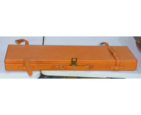 Gunmark rectangular light brown leather gun case with green felt interior and leather fastening 
