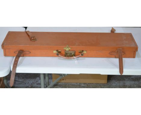 Rectangular light brown leather gun case with burgundy felt interior 