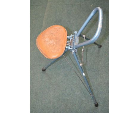 Vintage metal folding fishing chair with leather seat cushion. Light, comfortable and functional. 