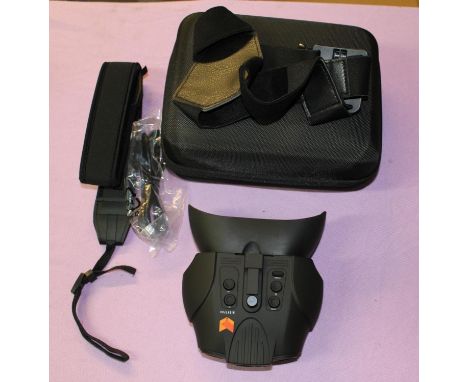 A boxed set of Nightfox Swift night vision goggles, in full working order but this item has a cracked display screen cover th