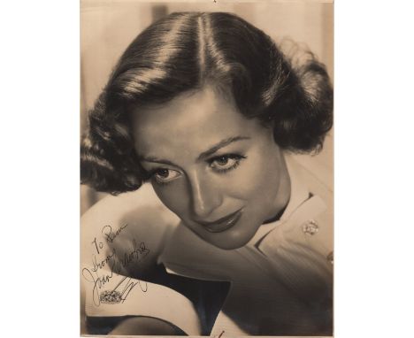 CRAWFORD JOAN: (1905-1977) American Actress, Academy Award winner. Vintage signed and inscribed sepia 9.5 x 12.5 photograph o