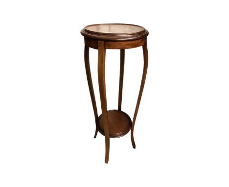 Early 20th Century Mahogany Jardiniere Stand. On outswept supports with lower shelfHeight 91 cms. Diameter across top 33 cms