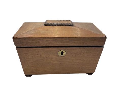 Mahogany Victorian Tea Caddy Of casket form. Original foil lining in place. Working lock with key. on small flattened bun fee