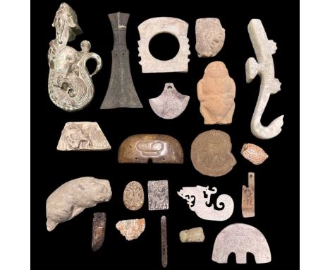 Chinese and Japanese carved Hardstone Items,including a calcified jade coiled dragon, various mulets, a jade peach and Funghi