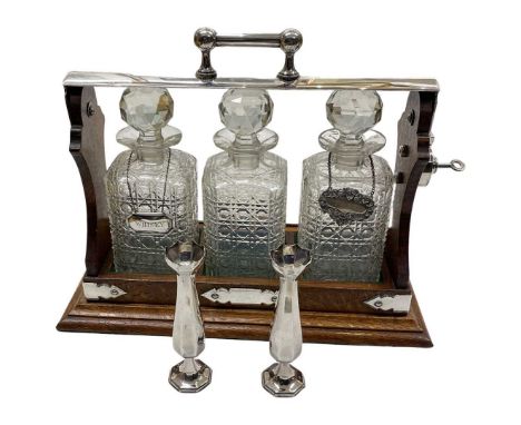 Good Quality Oak Mounted 3 Decanter Tantalus with Silver Decanter Labels. Silver labels for Whisky, Sheffield 1930, William H