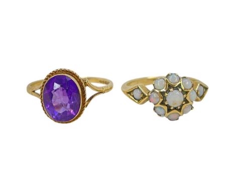 Two 9ct Gold Rings, 4.6g, to include a opal cluster ring and a 1970s amethyst ringsorted sizes Condition report: Good conditi