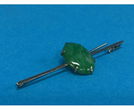 A white gold Jade brooch 