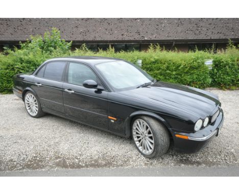 A 2005 JAGUAR XJR FOUR DOOR SALOON - 927 BRU - This supercharged Jaguar XJR saloon was first registered in October 2005. A VD