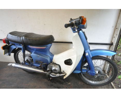 A 1990  HONDA CUB ECONOMY 90 - H336 GPB - This moped was first registered August 1990, it's has as 85cc petrol engine. Last M