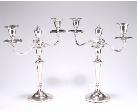 A PAIR OF GEORGE III THREE LIGHT CANDELABRA, by John Green, Roberts, Mosley &amp; Co, Sheffield 1794, the removable twin scro