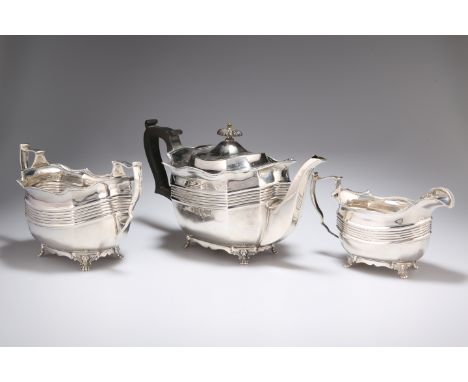 A SILVER THREE-PIECE TEA SERVICE,&nbsp;by&nbsp;Thomas Bradbury &amp; Sons Ltd, teapot, London 1897; two-handled sugar bowl an